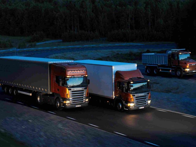 http://www.transportaxioma.be/wp-content/uploads/2015/09/Three-orange-Scania-trucks-640x480.jpg